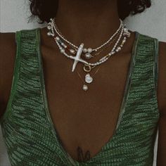 Midori is handcrafted with genuine freshwater pearls and gold filled hardware. This asymmetrical necklace has a unique pearl cross focal point. The perfect everyday pearl statement piece! *16.5” shown on model *please allow for variation in color/shape with natural gemstones/pearls as they are sisters and not twins. FINAL SALE Handle + Care: Show love to your Filosophy pieces by rinsing them with fresh water if you go swimming in them. To keep your Filosophy pieces in original, top condition, re Asymmetrical Necklace, Jewellery Photography, Go Swimming, Boho Choker, Show Love, Baroque Pearl Necklace, Stone Wrapping, Neck Jewellery, Funky Jewelry