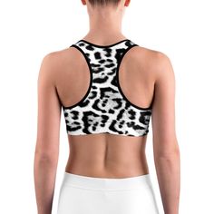 This gorgeous sports bra is made from moisture-wicking material that stays dry during low and medium intensity workouts. The bra has support material in the shoulder straps, double layer front, and a wide elastic band to ensure constant support. Workout Racerback Bra With Built-in Padding, Fitted Breathable Yoga Bra, Sleeveless Gym Bra With Built-in Padding, White Fitted Yoga Bra, White Sports Bra For Athleisure, Sports Bra With Built-in Padding And Racerback, Racerback Gym Bra With Built-in Padding, Compression Crop Top With Medium Bust Support For Sports, White Racerback Workout Bra