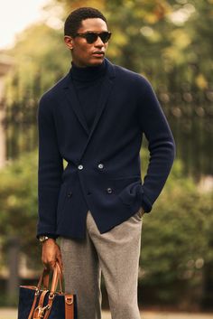 Ideal for both casual and weekend wear, the Cashmere Double-Breasted Cardigan reimagines the navy blazer into a softly-spun knit. Mirroring the fine construction of a Ralph Lauren PurpleLabel sport coat, the cardigan’s notch-collar lapels gracefully roll to the buttoning point while a subtle seed stitch texture adds visual depth.

Discover more spring menswear from the Pre-Spring 2022 collection via the link. Double Breasted Blazer Men, Navy Blazer Outfits, Spring Menswear, Winter Outfits For Men, Outfit Looks, Outfits For Men, Mens Outfit Inspiration, Seed Stitch