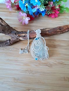 Silver Wire Wrap Sea Glass necklace, Beach Glass necklace, Handmade Boho necklace, Sea Glass Jewellery, Women's present, Unique Gift for Her  Beautiful piece of Natural Aqua Sea Glass pendant, wrapped on Silver plated wire, Blue Crystal beads & 925 Silver plated chain 18" 💝 This item is perfect gift idea for the Loved ones or for yourself, for Birthdays and any other special occasions.   The necklace come with gift bag ❤ FIND US: FACEBOOK at: www.facebook.com/foxjewelleryshop INSTAGRAM: www.ins Beach Glass Necklace, Glass Jewellery, Sea Glass Pendant, Sea Glass Necklace, Unique Gifts For Her, Sea Glass Jewelry, Beach Glass, Handmade Boho, Glass Necklace