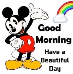 a mickey mouse with a rainbow in the background and good morning have a beautiful day