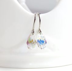 Swarovski crystal teardrop briolettes have an unsurpassed brilliance and loved the simplicity of using just one sparkling crystal. I have attached the sparkling gems to silver plated ear wires. The briolettes are 13mm making the earrings about an inch long. Copyright ©, all rights reserved. LoveYourBling® is an authorized SWAROVSKI® Crystals Branding Partner. Faceted Teardrop Crystal Earrings For Formal Events, Faceted Teardrop Crystal Earrings For Formal Occasions, Faceted Teardrop Crystal Earrings For Parties, Teardrop Faceted Crystal Earrings For Formal Occasions, Elegant Clear Teardrop Crystal Earrings, Faceted Crystal Teardrop Earrings, Everyday Nickel-free Teardrop Crystal Earrings, Cheap Nickel-free Teardrop Crystal Earrings, Nickel-free Teardrop Crystal Earrings For Anniversary