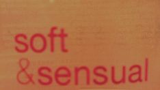 a red sign that says soft and essensual