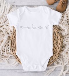 ** Quick Sizing Tip ** Baby ONESIES® Brand Bodysuits tend to run very small so we recommend sizing up for a better fit and to give baby longer wear time because they grow so fast. Toddler shirts are true to size. 📋 HOW TO ORDER: ✧ Choose Baby ONESIES® Brand Bodysuit or shirt size (sizing chart below) and sleeve length ✧ Select design color if applicable ✧ For personalized designs - enter customization in "Add your personalization" field ✧ ADD TO CART ✧ Select from our shipping class options (al White Cotton Onesie With Dinosaur Print, Cute Fitted Dinosaur Print Onesie, Cute White Onesie With Dinosaur Print, Cricut Onsies, Gerber Organic, Baby Shower Gifts For Boys, Baby Newborn, Newborn Baby Gifts, Consumer Products