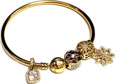 Luxury Yellow Gold Beaded Jewelry, Yellow Gold Bangle With Charms, Luxury Yellow Gold Jewelry With Gold Beads, Luxury Gold Beaded Bracelets For Gift, Luxury Yellow Gold Bracelets With Beads, Luxury Yellow Gold Bracelet With Gold Beads, Gold Charm Bangle Bracelet, Luxury Yellow Gold Bracelet With Charms, Luxury Gold Rondelle Bracelets