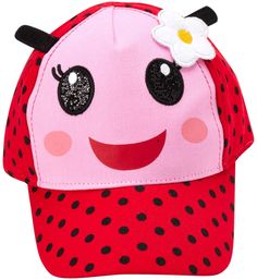 a pink hat with black dots and a white flower on the front, featuring a smiling face