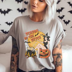 Available in other Colors-Vintage Inspired Witchy Halloween Graphic Tee Ash, Clay, Musturad, Lilac, Berry, White, Pink and Peach Sizing Chart in photo section See more Halloween items at https://modernostalgiaco.etsy.com Free Shipping-Over $35 or more See shipping time for details. If available it will ship out early, we strive to get all orders out within one to three business days. Witch Tshirt, Witchy Halloween, Fall Apparel, Halloween Graphic Tees, Halloween Graphic, Season Of The Witch, Halloween Items, Pumpkin Shirt, Halloween Trick Or Treat