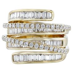 This ring is made in 18 Karat Yellow Gold. It features 40 round cut, prong set diamonds weighing 0.49 carats. Along with 62 tapered baguette cut, channel set diamonds weighing 1.39 carats. With a color grade (H) and clarity grade (SI2). Baguette Cut Diamond Ring With Pave Setting, Dazzling Baguette Diamond Round Cut Rings, Yellow Gold Diamond Ring With Pave Setting, Baguette Cut, Dazzling Diamond Rings With Baguette Diamonds, Fine Jewelry Diamond White Ring With Baguette Diamonds, Yellow Gold Diamond Ring With Baguette Diamonds, Luxury Baguette Diamond Cluster Ring With Round Cut, Luxury Cluster Ring With Baguette Diamonds, Fine Jewelry Diamond Ring With Brilliant And Baguette Cuts