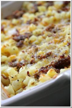 a casserole dish with meat and cheese on it, ready to be eaten