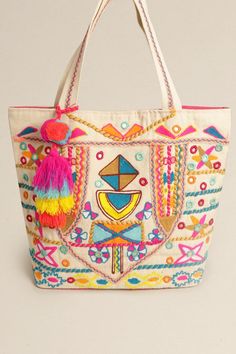 Boho Pattern Shoulder Bag with Pom Pom Tassel Magnetic closure with a single zip pocket, 2 slip pockets Plenty of space to carry your belongings. **Size Approx. 19" W x 15" H x 5.5" D** Daily Use Double Handle Bags With Tassels, Bohemian Shoulder Bag With Zipper Pocket For Travel, Travel Satchel Hobo Bag With Tassels, Travel Hobo Bag With Tassels, Travel Shoulder Bag With Tassels, Daily Use Double Handle Tassel Bags, Double Handle Shoulder Bag With Tassels For Travel, Daily Use Pouch Bag With Tassels, Everyday Tote Bag With Tassels