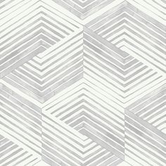 a white and gray geometric pattern with lines on it's surface, in shades of grey