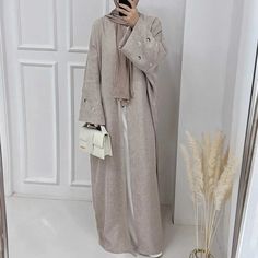 Casual Fall Abaya, Modest Long Abaya For Fall, Casual Winter Abaya, Casual Long Abaya For Fall, Casual Long Fall Abaya, Elegant Long Winter Abaya, Casual Long Abaya For Winter, Casual Long Winter Abaya, Spring Beige Long Sleeve Abaya