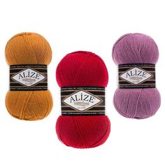 three balls of yarn in different colors