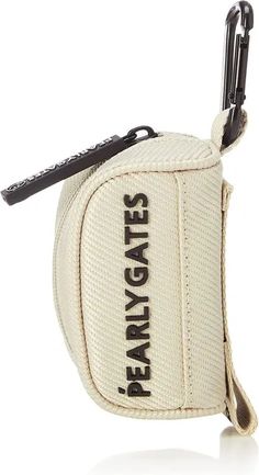 a white bag with black writing on the side and a keychain attached to it