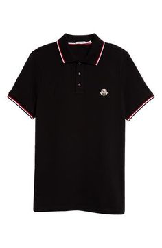 Classic tipping at the collar and cuffs enhances the sporty look of this cotton-piqué polo detailed with Moncler's signature cockerel logo at the chest. Button half-placket Rib collar Short sleeves with rib cuffs 100% cotton Dry clean or hand wash, dry flat Made in Turkey Men's Designer Clothing Classic Short Sleeve Polo Shirt With Striped Cuffs, Designer Black Polo Shirt With Collared Neckline, Black Designer Polo Shirt With Collared Neckline, Designer Black Polo Shirt With Ribbed Collar, Designer Black Polo Shirt With Embroidered Logo, Classic Black Polo Shirt With Contrast Collar, Black Polo Tops With Contrast Collar, Collared Polo Shirt With Embroidered Logo For Work, Collared Polo Shirt With Embroidered Logo