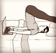 a woman laying in bed with her laptop on her stomach and arms stretched out to the side