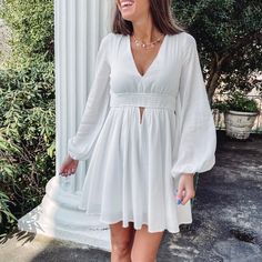 - 100% Cotton - Lined - Shorts underneath - Ties along the back - Elastic waistband - True to size - Model is pictured in a size small The Back, Long Sleeve Dress, Elastic