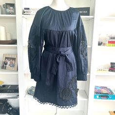 Adorable Cynthia Rowley Navy Blue Tulip Puffy Sleeves Dress With Matching Belt And Two Pockets. Beautiful Tulip Details In Sleeves And Around Hem. Fabric Is 98% Cotton And 2% Elastane Allowing And Creates A Flattering Effect When Worn. Pair With A Pair Of Wedges Or Flats Or Dress It Up With Heels. Size Xtra Small, But Fits More Like A Small Dry Clean Only Spring Navy Long Sleeve Mini Dress, Blue Lace Trim Dress For Fall, Navy Dress For Spring Brunch, Spring Navy Dress For Brunch, Navy Knee-length Dress For Spring, Navy Knee-length Spring Dress, Navy Mini Length Spring Dresses, Navy Mini Dress For Spring, Navy Midi Dress For Spring Daywear