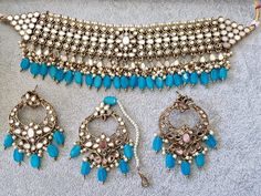 Ferozi Mirror Choker Set in Antique Gold Finishing Includes Choker, Earrings and Tikka  Perfect for Parties, Weddings, Events etc Bohemian Jewelry Sets With Intricate Design For Wedding, Bohemian Jewelry Sets With Matching Earrings For Wedding, Bohemian Wedding Jewelry With Round Beads, Handmade Bridal Earrings For Wedding And Festivals, Bohemian Jewelry Sets For Wedding Festivals, Blue Kundan Bridal Earrings For Wedding, Blue Bridal Earrings For Wedding, Bohemian Round Bridal Necklace For Wedding, Festive Blue Bridal Earrings For Wedding