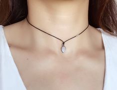 "Stylish and effortless 0.5mm black leather cord Necklace with moonstone or seaglass pendant . It is very comfortable and stand out! If this is too dainty for you please check out the thicker and bigger version: https://www.etsy.com/listing/536000591/dark-brown-leather-cord-lace-knocked?ref=shop_home_active_9 Or the match bracelet: https://www.etsy.com/listing/543430942/leather-cord-lace-knocked-with-hill?ref=shop_home_active_1 Each necklace is around 22\" and have double knot you can adjust the Moonstone Choker, Delicate Choker Necklace, Boho Choker Necklace, Black Leather Necklace, Double Knot, Cord Lace, Cord Jewelry, Boho Choker, Choker Pendant