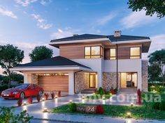 a car is parked in front of a two story house at night with lights on