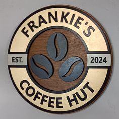 the logo for frankie's coffee hut, which is located on the side of a building