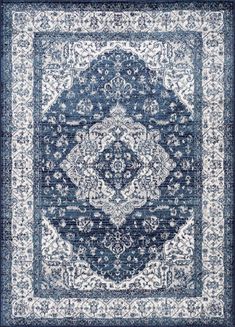 a blue and white rug with an intricate design