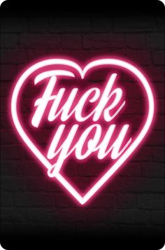 a neon sign that says i love you in the shape of a heart on a brick wall