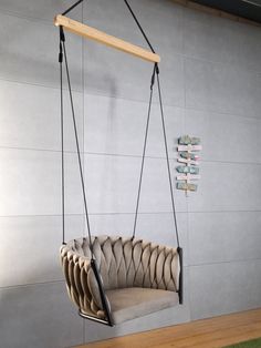 a chair that is hanging from the ceiling