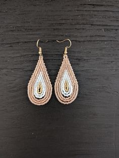 Handwoven seed bead teardrop bead drop earrings. Brick-stitched and woven with coral, pearl white, and metallic gold glass seed beads. Tear Drop Beaded Earrings, Stitch Earrings, Bead Drop Earrings, Brick Stitch Earrings, Beaded Drop Earrings, Teardrop Beads, Drop Beads, Gold Glass, Seed Bead Earrings