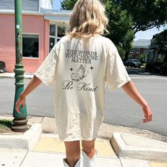 Get ready to fall in LOVE with your new Your Words Matter, Be Kind comfort colors shirt. This shirt features a back print and small butterfly on the front. It's the cutest and most comfortable way to show off the latest styles. Also makes a great gift! * PRODUCT DETAILS * ✺ 100% Cotton ✺ Medium weight fabric (super soft feel) ✺ Wash and dry normally (on cool for best results) ✺ Designed and printed in the USA ✺ Due to different monitor screens, colors may vary ✺ * SIZING * ✺ FOR AN OVERSIZED FIT Casual Cotton T-shirt With Quote Print, Spring Tops With Back Print And Short Sleeves, Summer Cotton T-shirt With Quote Print, White Summer T-shirt With Quote Print, Relaxed Fit Tops With Quote Print For Streetwear, Casual T-shirt With Back Print For Fall, Spring Cotton T-shirt With Back Print, Summer Cotton Shirt With Back Print, Cotton T-shirt With Back Print For Spring