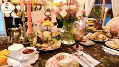 a table is set with plates, cups and saucers for desserts or snacks