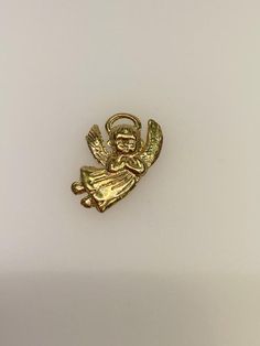 Vintage 14k yellow guardian angel charm. The charm is 2.73 grams of gold. Orange Blossom Wedding, Angel Charm, Charm Necklaces, Boston Ma, Diamond Solitaire Engagement Ring, Vintage Engagement, Guardian Angel, Gold Wedding Band, Orange Gold