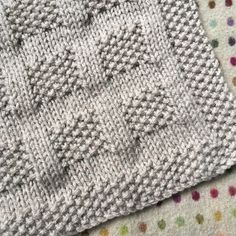 a close up view of a knitted blanket