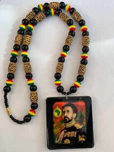 Rastafari H I M selassie square wooden hand made necklace Hangs on beaded necklace about 24/25 inches.  All items in this shop are handmade by us All our products are made by us rasta family, we do not sell anything that we haven't made Bless All items are sent with a track and signed service Africa Necklace, Sell Anything, Square Necklace, Hippie Bags, Wooden Necklace, Wood Necklace, Black Necklace, Wooden Hand, Wooden Earrings