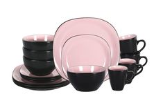 a black and pink dinner set with cups