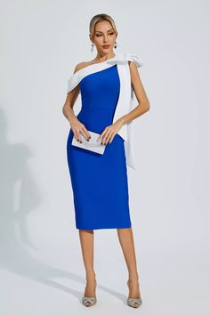 The Braelyn Blue Bow One Shoulder Bandage Dress exudes elegance and style. This stunning evening dress features a bandage skirt in a fashionable contrasting color, accentuated by a beautiful white bow on one shoulder. Perfect for parties and social gatherings, this dress is an excellent choice for bridesmaids or any glamorous event.  Dress Length: Approx 108cm Materials: Bandage  Gentle Dry Clean Only  The model is 5 ft 7 and wears size S  Color may vary due to lighting on images. The product im Silver Sequin Top, Glitter Wedding Dress, Bandage Skirt, Bandage Midi Dress, Event Dress, Floral Shirt Dress, Puff Sleeve Dresses, Maxi Knit Dress, White Bow