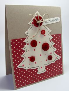 a handmade christmas card with a red and white polka doted tree on it