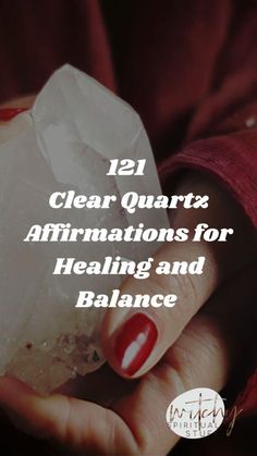 a woman's hand holding a rock with the words, 121 clear quartz affirmations