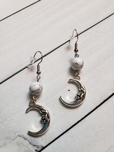 Crescent Moon Howlite Drop Earrings The perfect boho accessory for a night out on the town! Beautiful silver plated crescent moons and 8 mm genuine howlite beads. Only 1 Available Cheap Moon Charm Drop Earrings, Love Earrings, Boho Accessories, Crescent Moon, Cute Jewelry, Earrings Jewelry, Crescent, Jewelry Earrings Dangle, Etsy Earrings