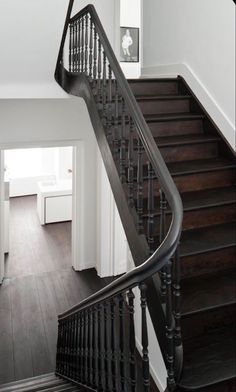 a black and white staircase in a house