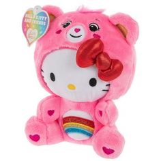 a hello kitty stuffed animal with a bow on its head