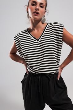 Sleeveless t shirt with shoulder pad in black stripe Szua Store Striped Sleeveless Top, Sleeveless T Shirt, Bold Stripes, Woven Top, Sleeveless Tshirt, V Neck Tops, Stripes Design, Step Up, Black Stripes