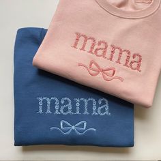 two personalized sweatshirts on top of each other, one with a bow tie