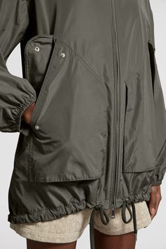 Lightweight and functional, the Melia parka is crafted from taffeta and enhanced with breathable mesh lining. Designed with supreme wearability in mind, drawstring fastening on the back adapts the jacket's silhouette to fit your body and mood. Easily worn every day, the parka jacket is featured in a palette of elevated neutrals. Rain Jackets For Women, Personalized Jacket, Collarless Shirt, Raincoats For Women, Cardigan Shirt, Outerwear Outfit, Down Jackets, Fashion Design Clothes, Parka Jacket