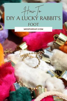 how to diy a lucky rabbit's foot with lots of colorful pom poms