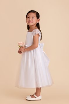 Here comes the...flower girl! Our Lily Flower Girl Dress is adorned with lace sleeves and a crystal brooch. Available in White. Shop Birdy Grey! This lace sleeve flower girl gown is complete with a crystal brooch for an elegant, adorable style. | White Size 6 | Birdy Grey Lily Flower Girl Dress White Dresses For Sale, Flower Girl Gown, Adorable Style, Tuxedo Women, Birdy Grey, White Flower Girl Dresses, Chic Shop, Crystal Brooch, Little White Dresses