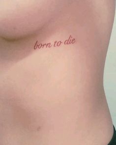 a woman's stomach with the words born to die written on her left side