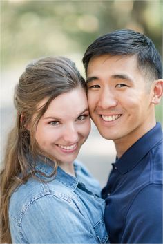 a man and woman are smiling for the camera