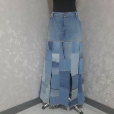 a woman's skirt made out of blue jeans